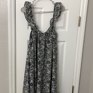 Black and white flower dress from Loft. New with tags. Lined with pockets.